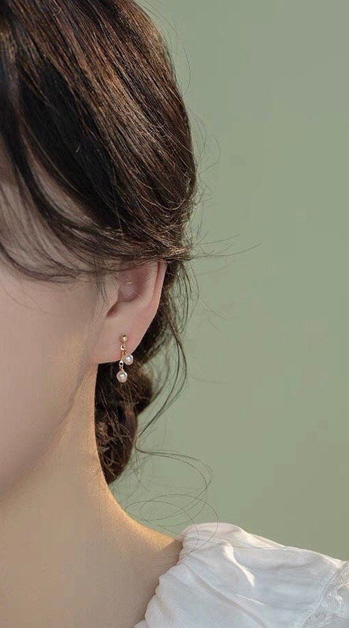 14K gold filled freshwater tiny pearl earring. Dainty earrings. Minimalist clip on earrings. Bridal earrings. No pain earrings.