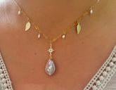 14K gold filled freshwater charm necklace. Multiple-chain necklace. Freshwater pearl necklace. Shell starfish leafs necklace.