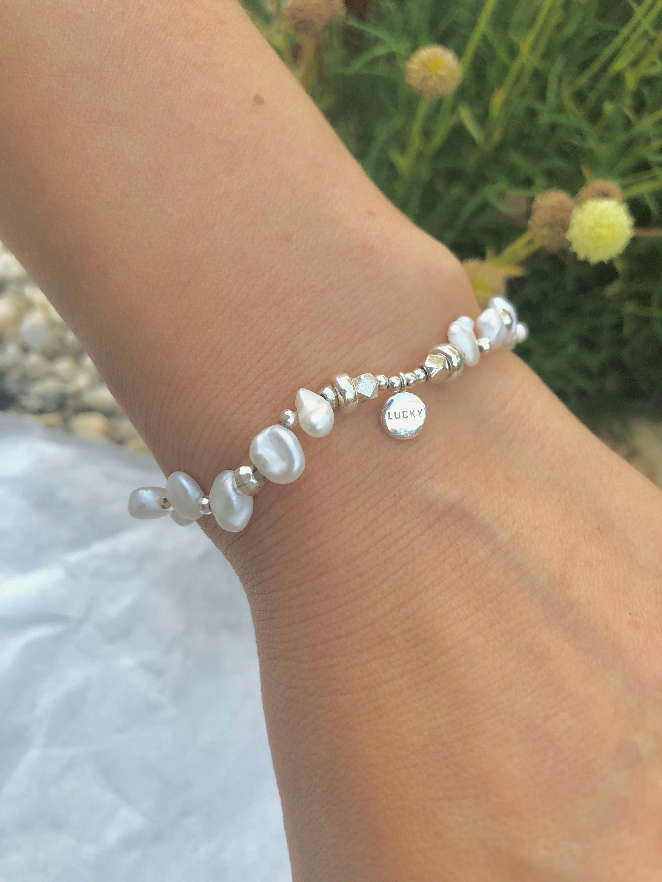 925 sterling silver freshwater pearl Dangle lucky designs bracelet. Baroque petal pearl bracelet. Adorable bracelet. Boho bracelet