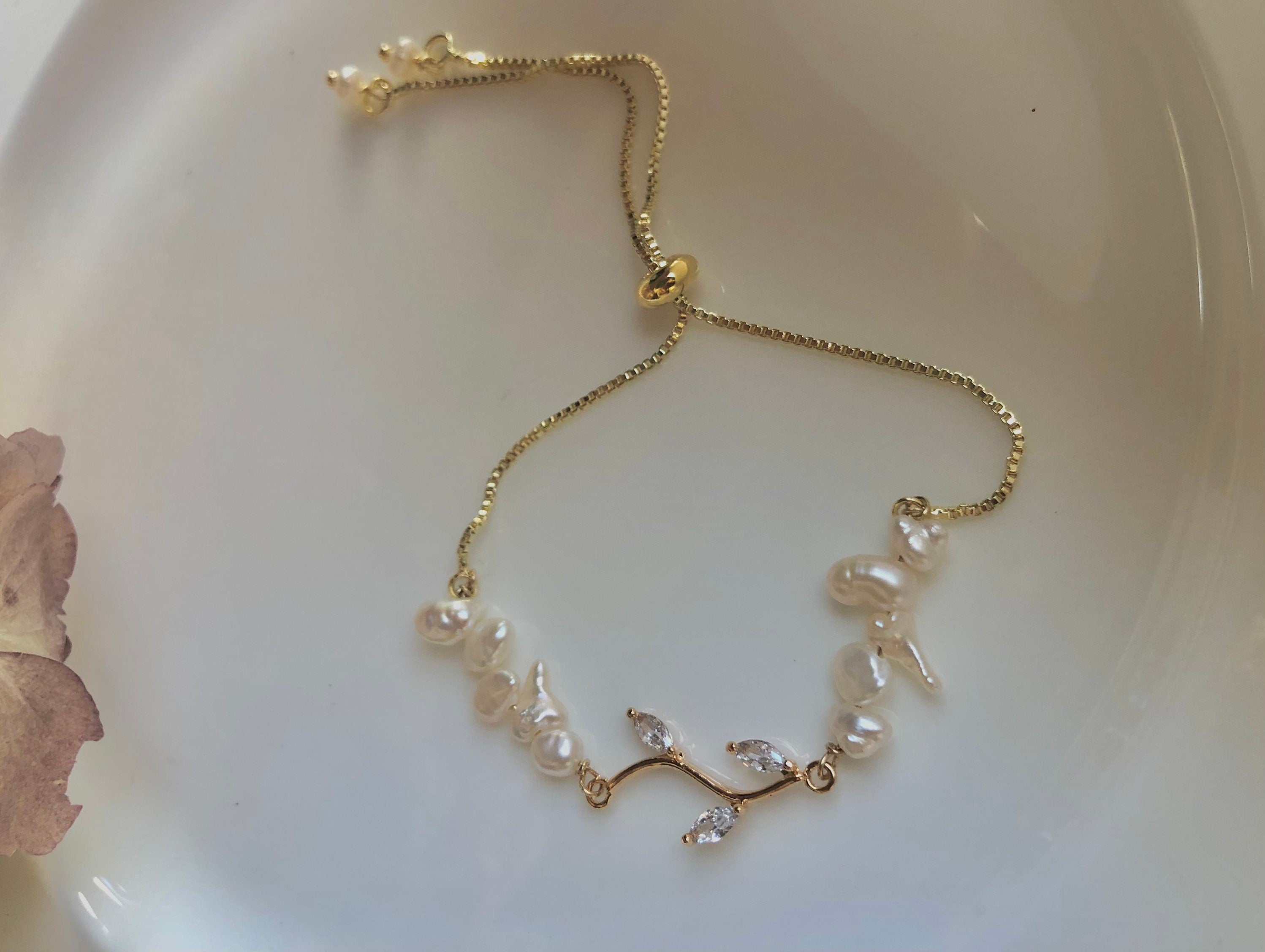 Small baroque pearls adjustable bracelet. Zircon leaf bracelet. Bridal pearl bracelet. Bridesmaid gift. Asymmetry bracelet. Gift for her.