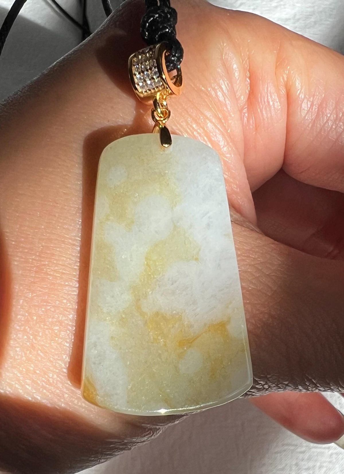 Jadeite Pendant with Yellow Markings