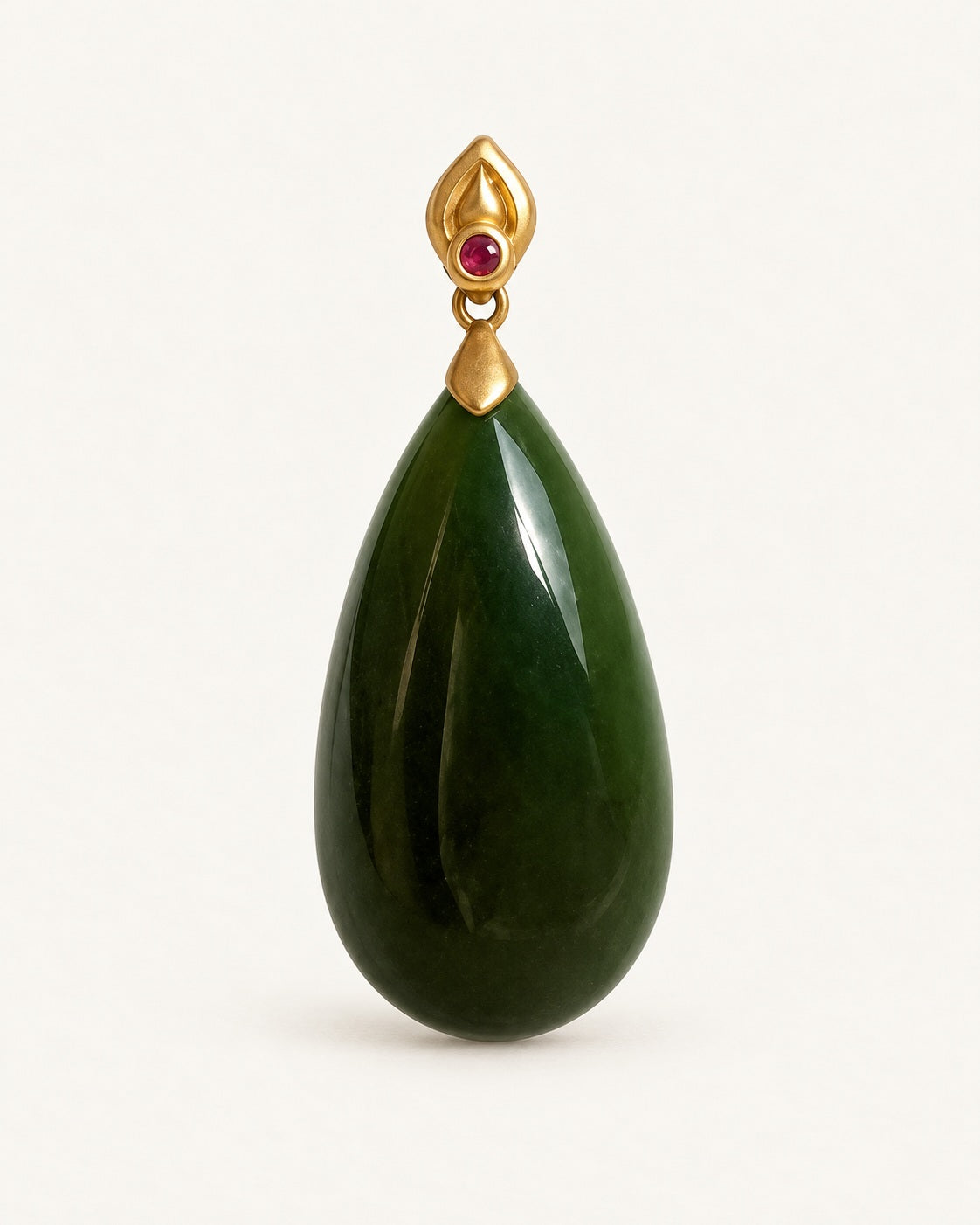 Green Nephrite Jade Teardrop Pendant in 18K Solid Gold — warm ivory studio photograph