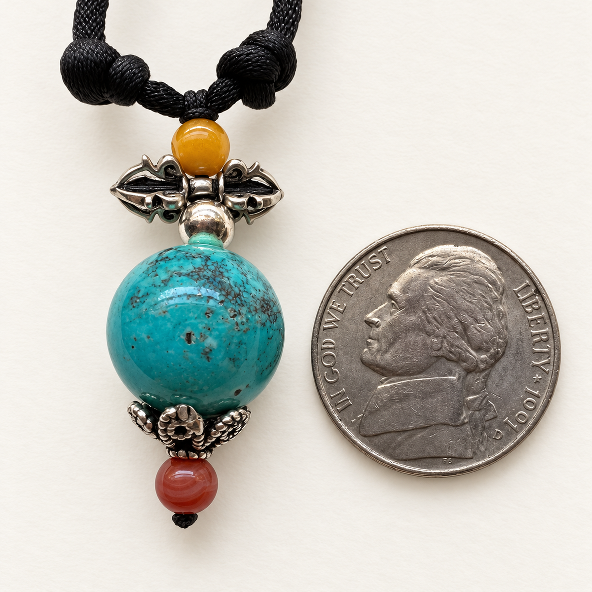 Natural turquoise vajra pendant with amber, Nanhong agate and sterling silver — scale view