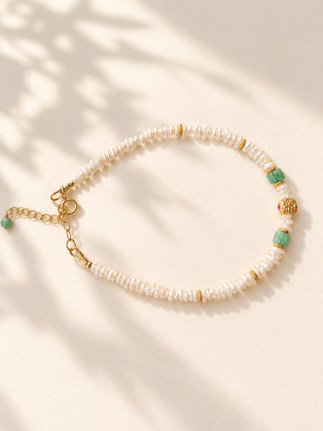 Ruby jadeite and freshwater pearl bracelet with gold-filled fittings, full view