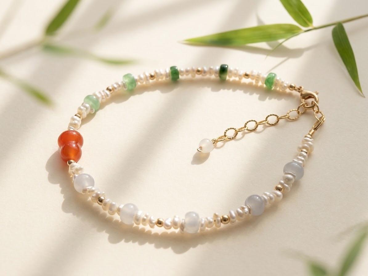 Jadeite pearl bracelet with orange-red gourd and adjustable extender