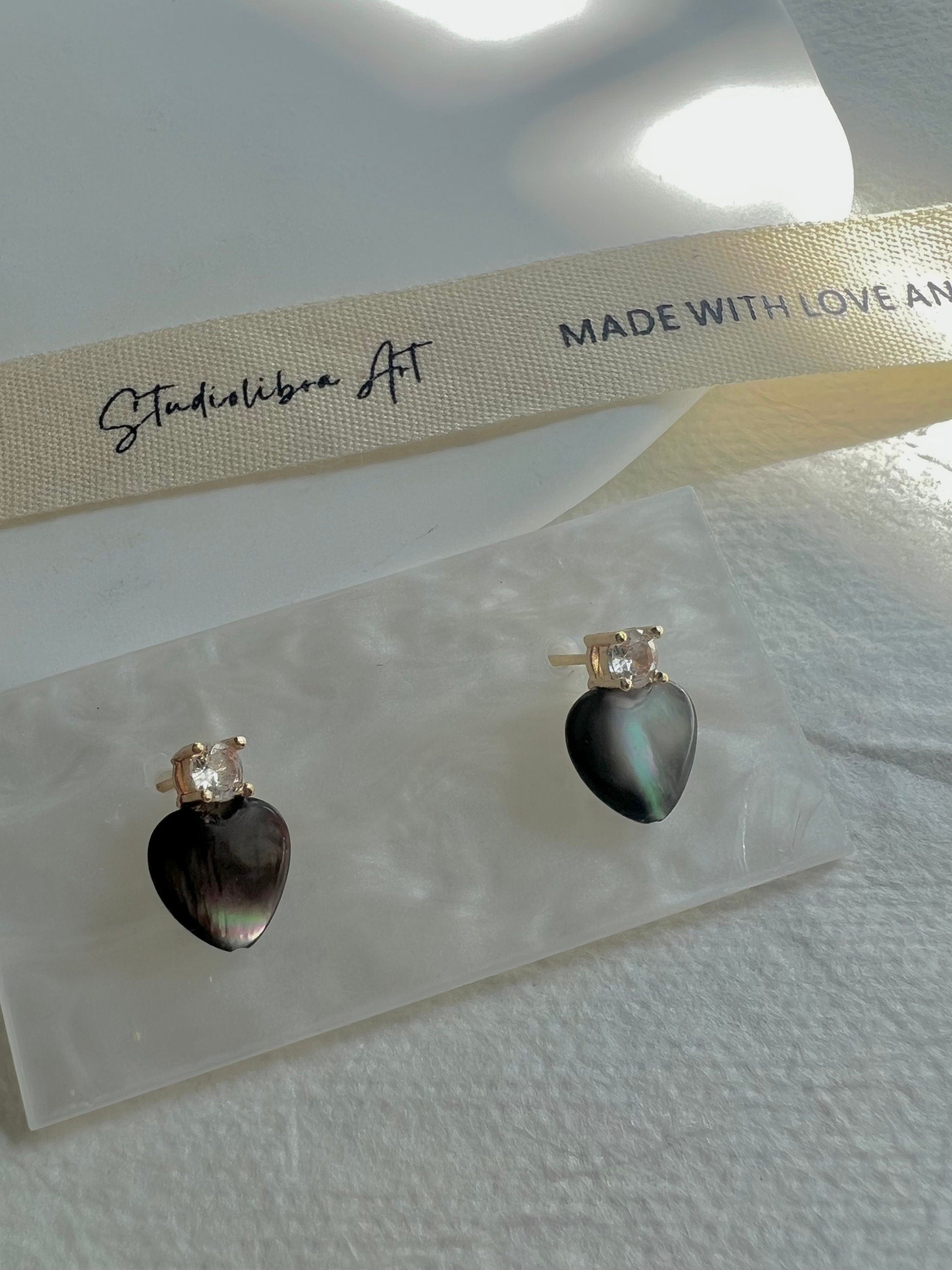 Dainty mother of pearl Minimalist heart earrings. Statement pearl earrings. Adorable earrings. Bridesmaid gift.