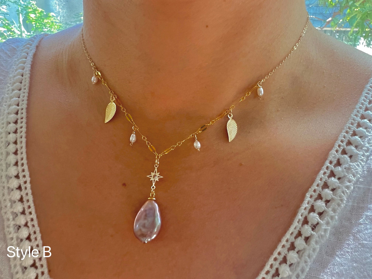 14K gold filled freshwater charm necklace. Multiple-chain necklace. Freshwater pearl necklace. Shell starfish leafs necklace.