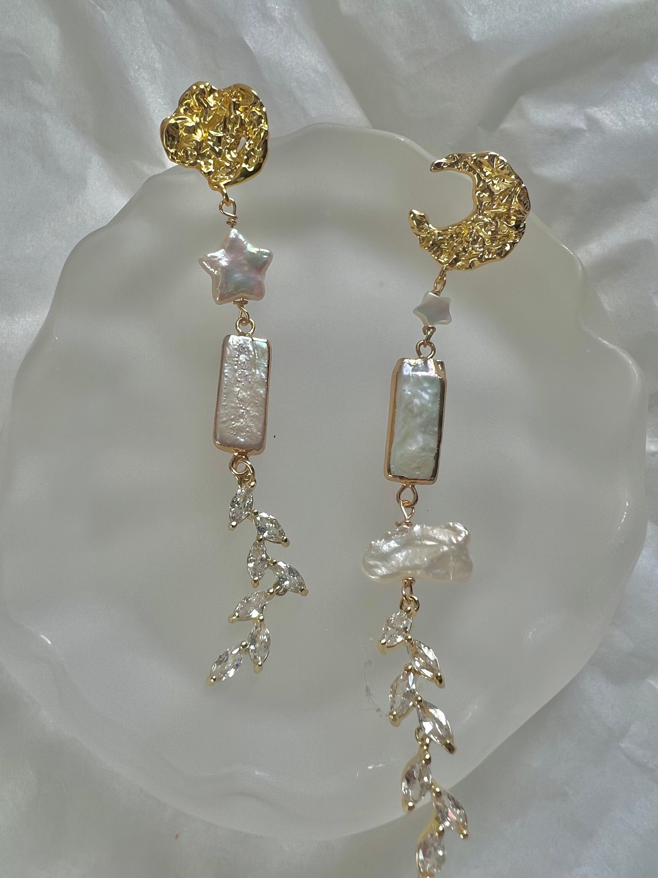 Chic moon star freshwater pearl unbalanced dangle earrings. Designed charm asymmetry earrings. Gift for her