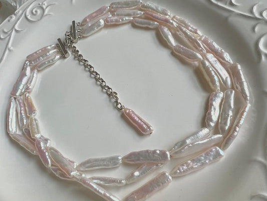 Freshwater keshi pearl triple layered strand necklace. Biwa pearl statement necklace. Boho necklace. OT chunky necklace. Wedding necklace