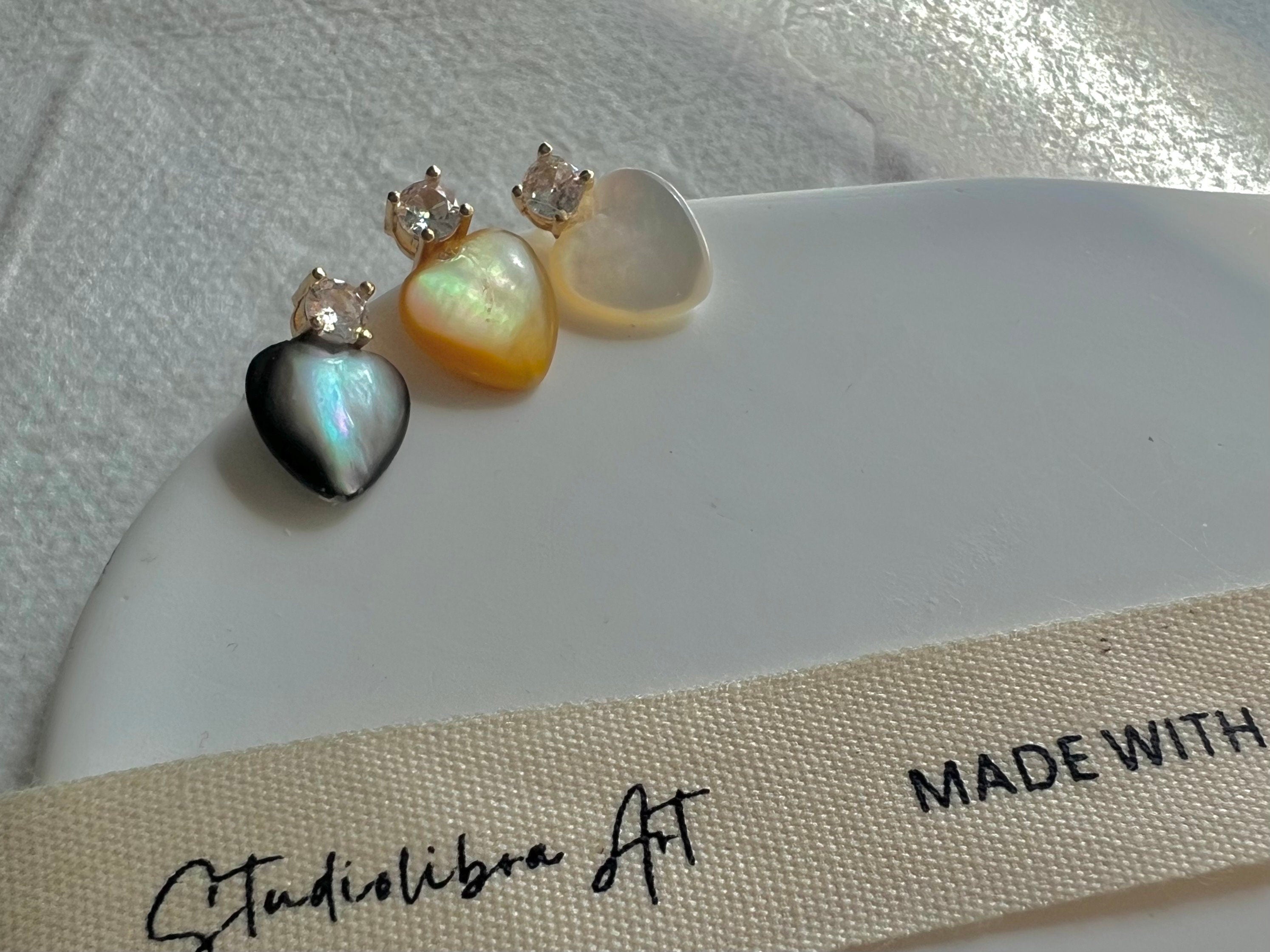 Dainty mother of pearl Minimalist heart earrings. Statement pearl earrings. Adorable earrings. Bridesmaid gift.