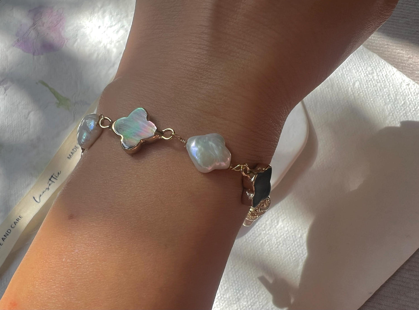 Freshwater multiple-color baroque clover pearl and mother of pearl clover bracelet. White four leaf flower bracelet.  Lucky bracelet.