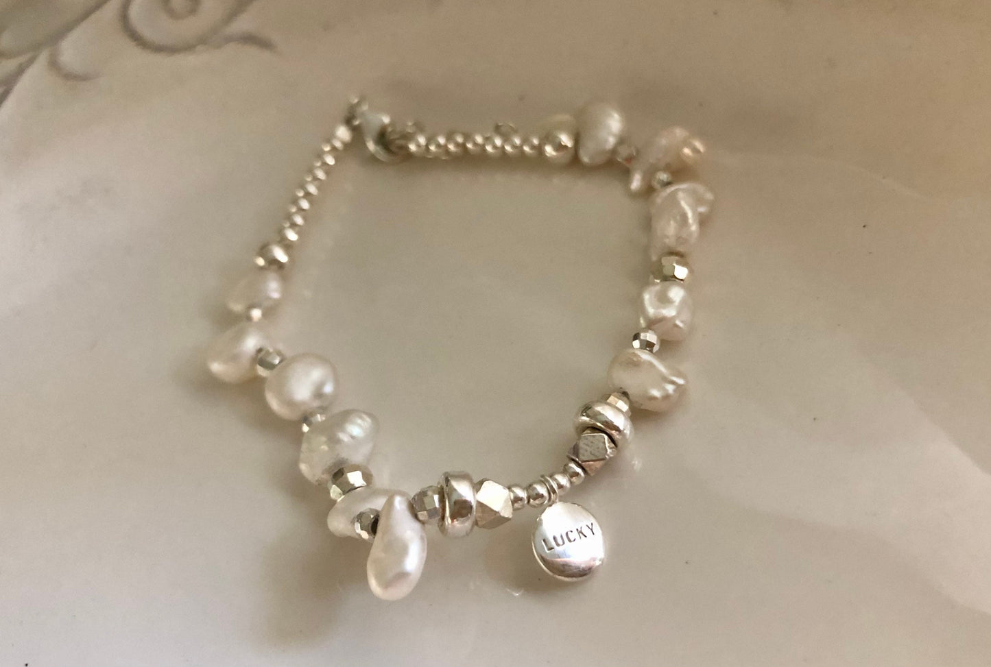 925 sterling silver freshwater pearl Dangle lucky designs bracelet. Baroque petal pearl bracelet. Adorable bracelet. Boho bracelet