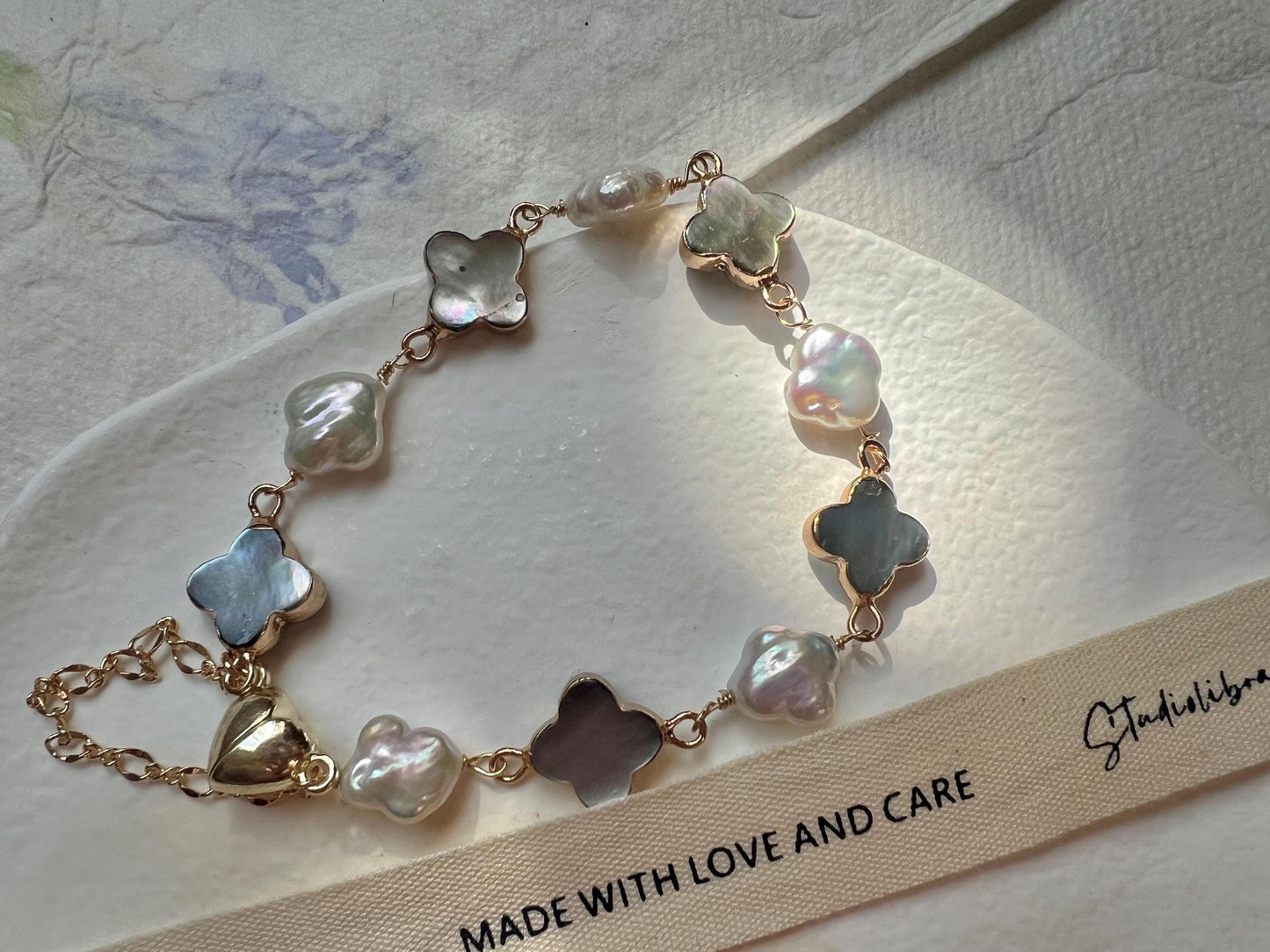 Freshwater multiple-color baroque clover pearl and mother of pearl clover bracelet. White four leaf flower bracelet.  Lucky bracelet.