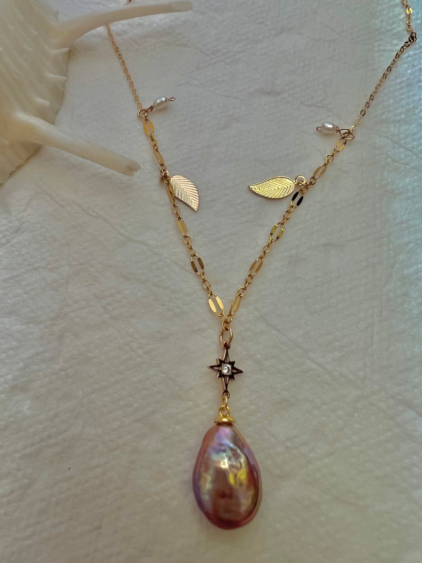 14K gold filled freshwater charm necklace. Multiple-chain necklace. Freshwater pearl necklace. Shell starfish leafs necklace.