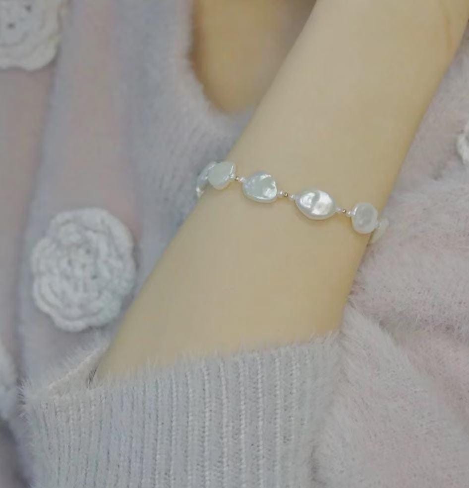14K gold filled High quality luster baroque AAAA Keshi pearl Top bracelet. Metallic reflection bracelet. Minimalist bracelet. Gift for her.