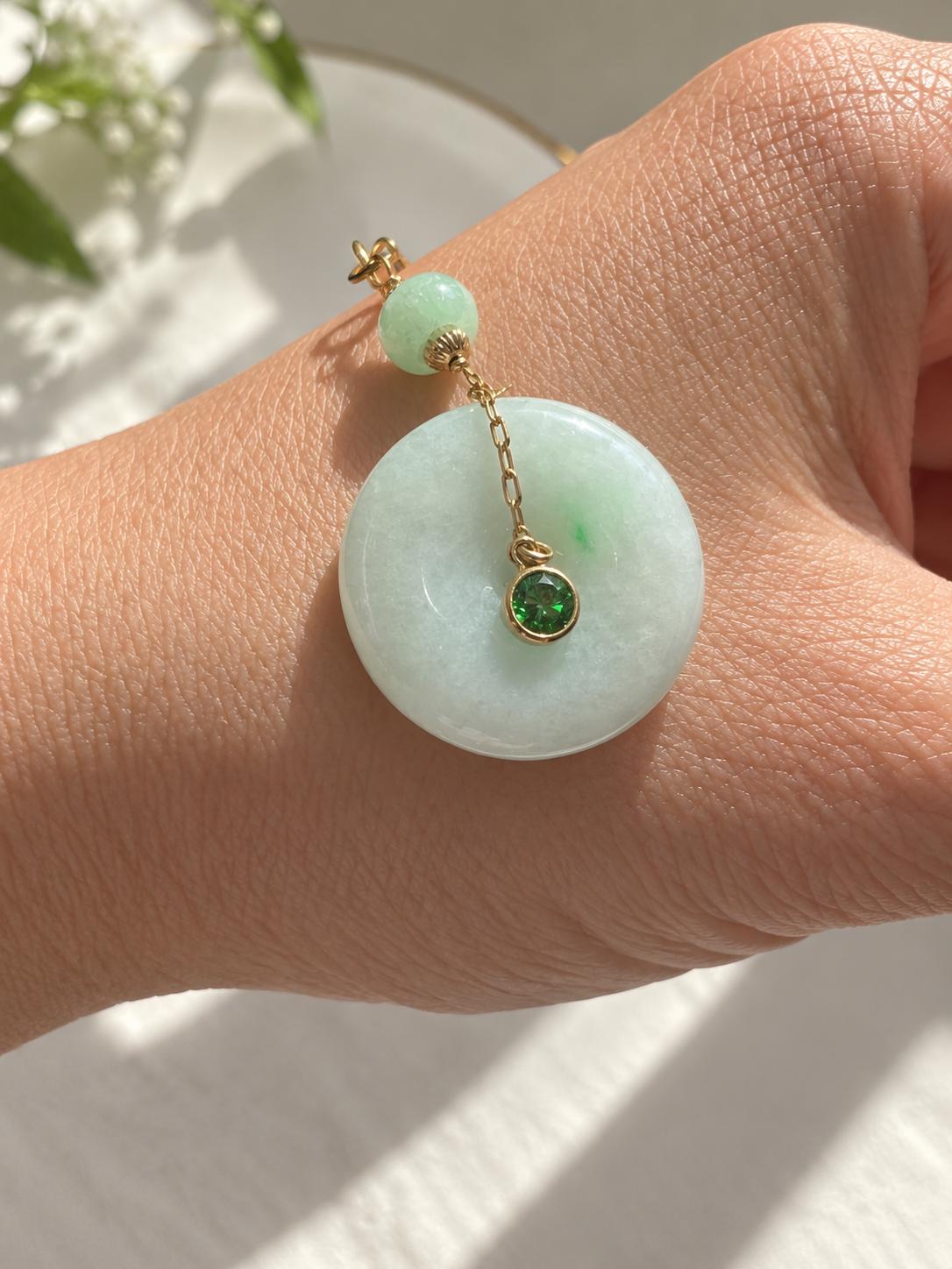 Jadeite Donut Pendant with Green Gemstone