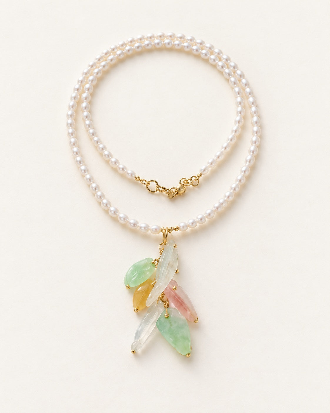 Seed Pearl & Jadeite Cluster Necklace — warm ivory studio photograph