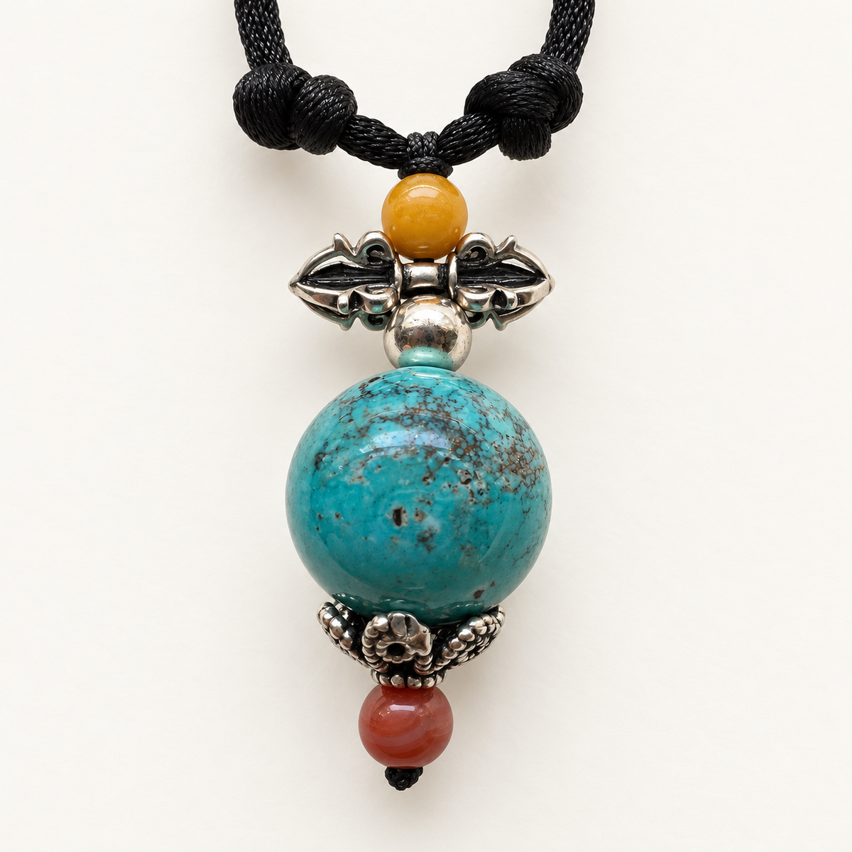 Natural turquoise vajra pendant with amber, Nanhong agate and sterling silver — detail view