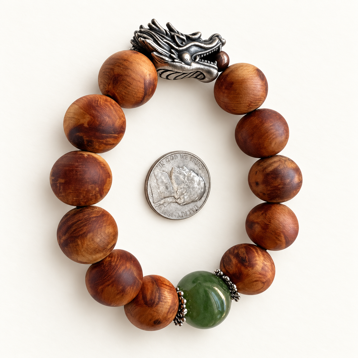 Wood and nephrite dragon bracelet with a nickel for approximate scale; coin not included.