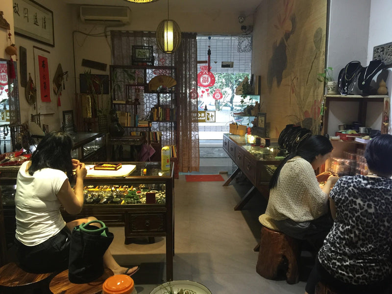 The original Guangzhou jewelry shop with customers at its counters.